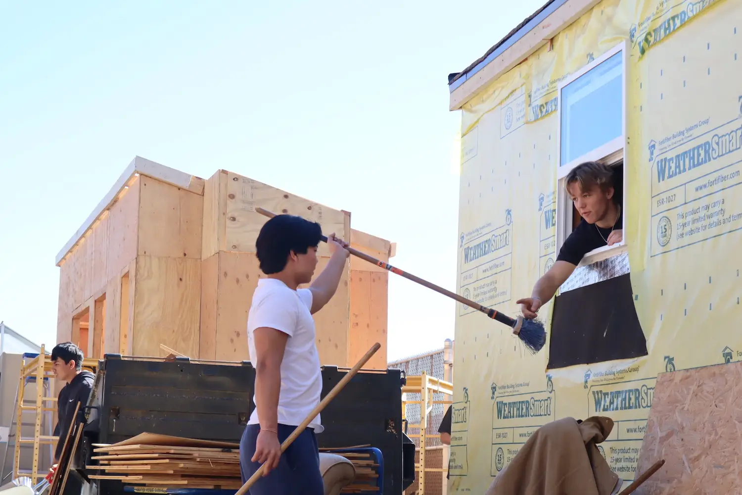 High school students from San Marcos High School working with the Warrior Village Project to build homes for homeless veterans in San Diego