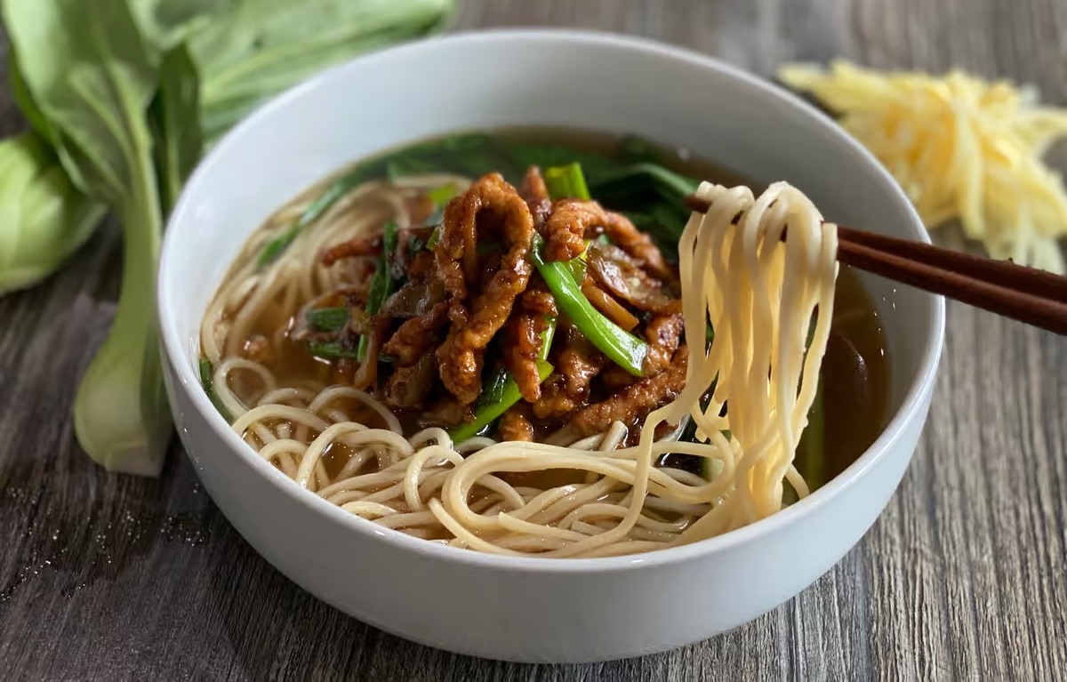 Bowl of noodles from San Diego restaurant Zen Modern Asian Bistro opening at the Sky Deck at Del Mar Highlands Town Center in 2025