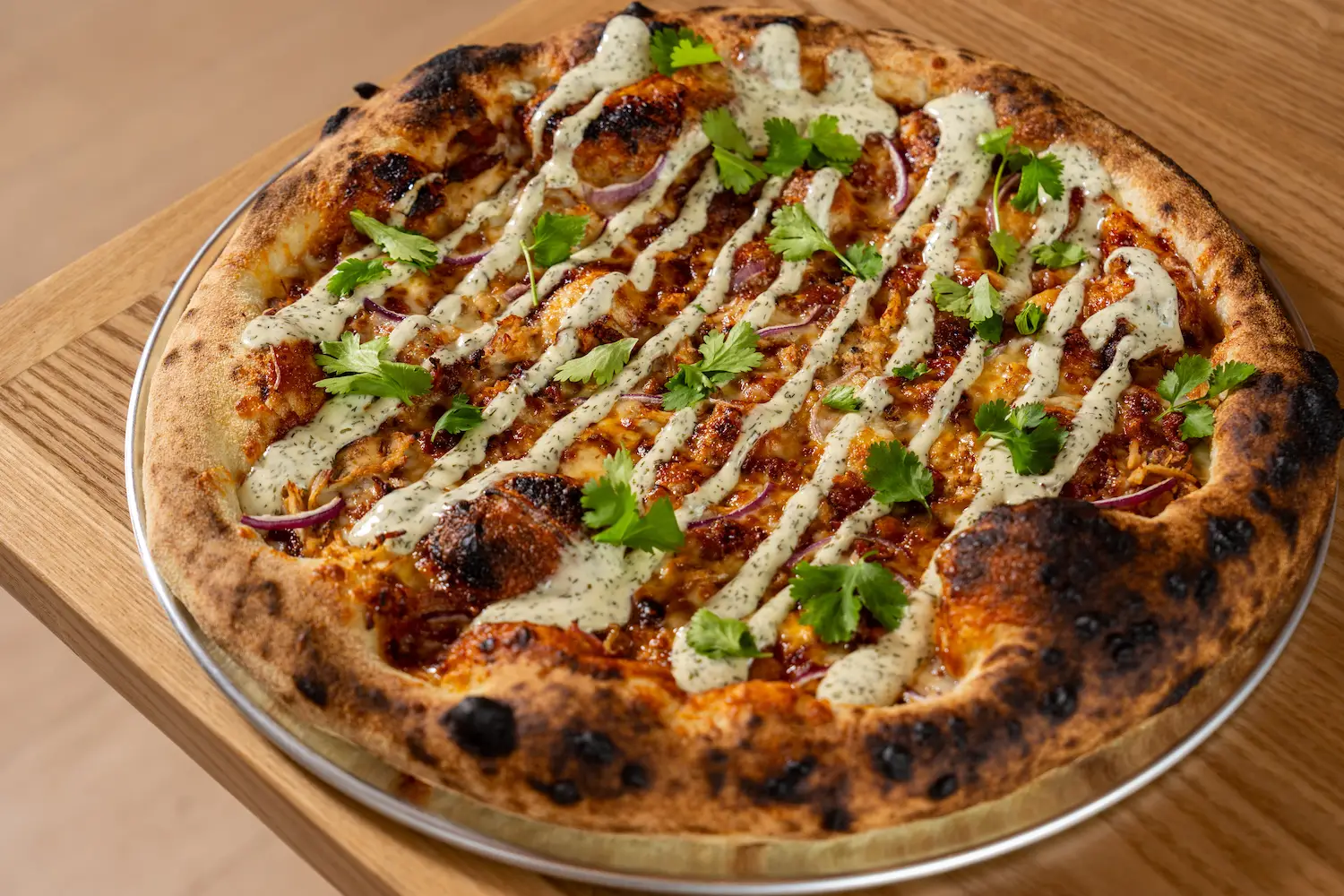 New San Diego pizza restaurant Odie's Pizza opening in Oceanside featuring a barbecue chicken pizza