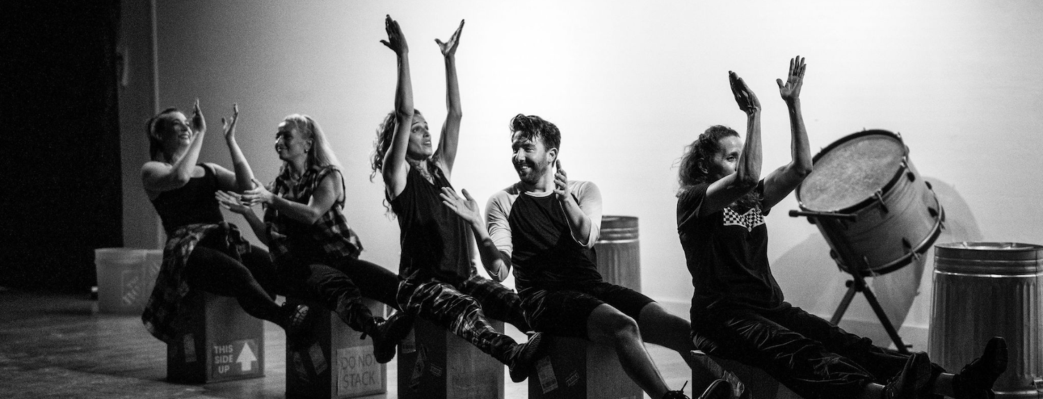 A drum group and singers performing at the 2025 San Diego International Fringe Festival