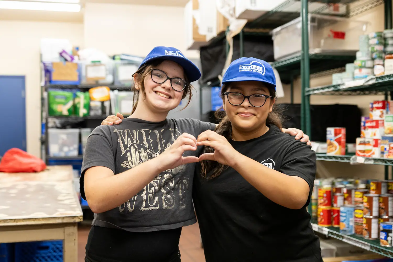 San Diego nonprofit Interfaith Community Services located in Escondido featuring youth volunteers at a food pantry