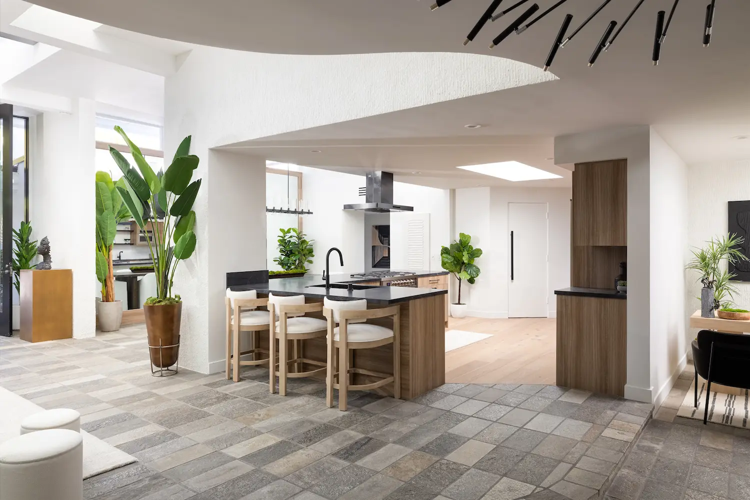 Kitchen and new flooring at HGTV's Hot Properties star Andrew White's San Diego home featuring redesigned by Andrew Gerhard