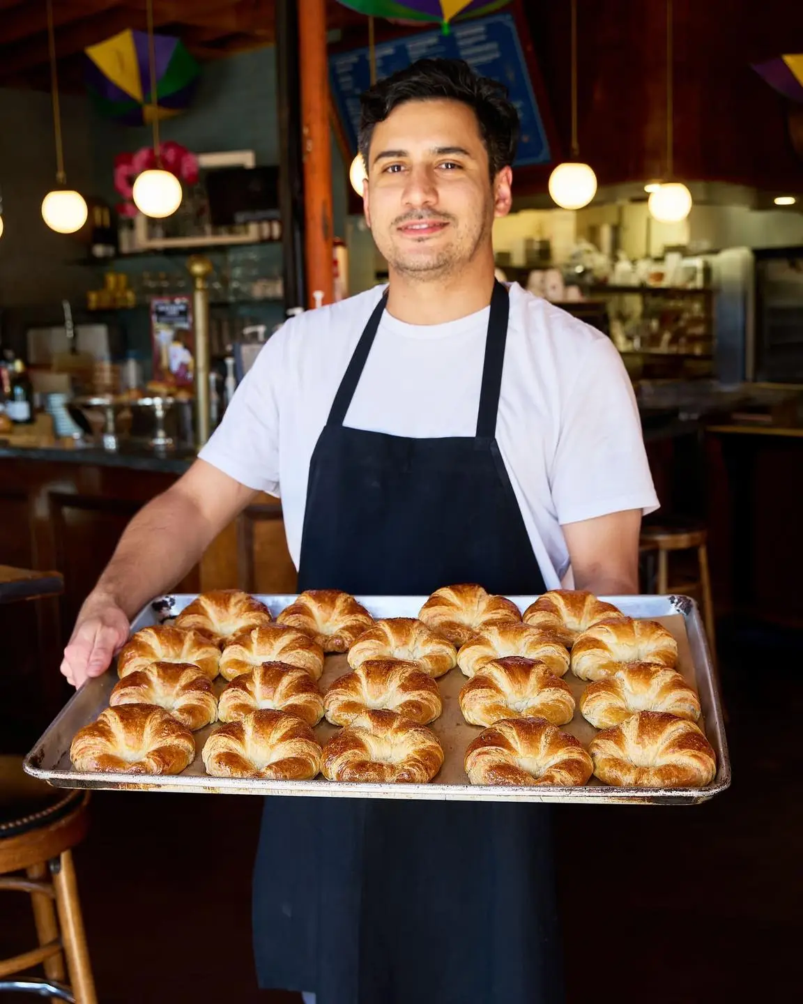 San Diego coffee and pastry shop Café Madeleine featuring baked croissants