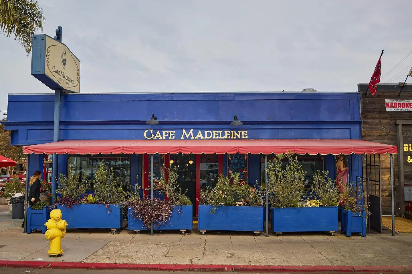 Exterior of San Diego coffee and pastry shop Café Madeleine opening a new location in Barrio Logan in 2025