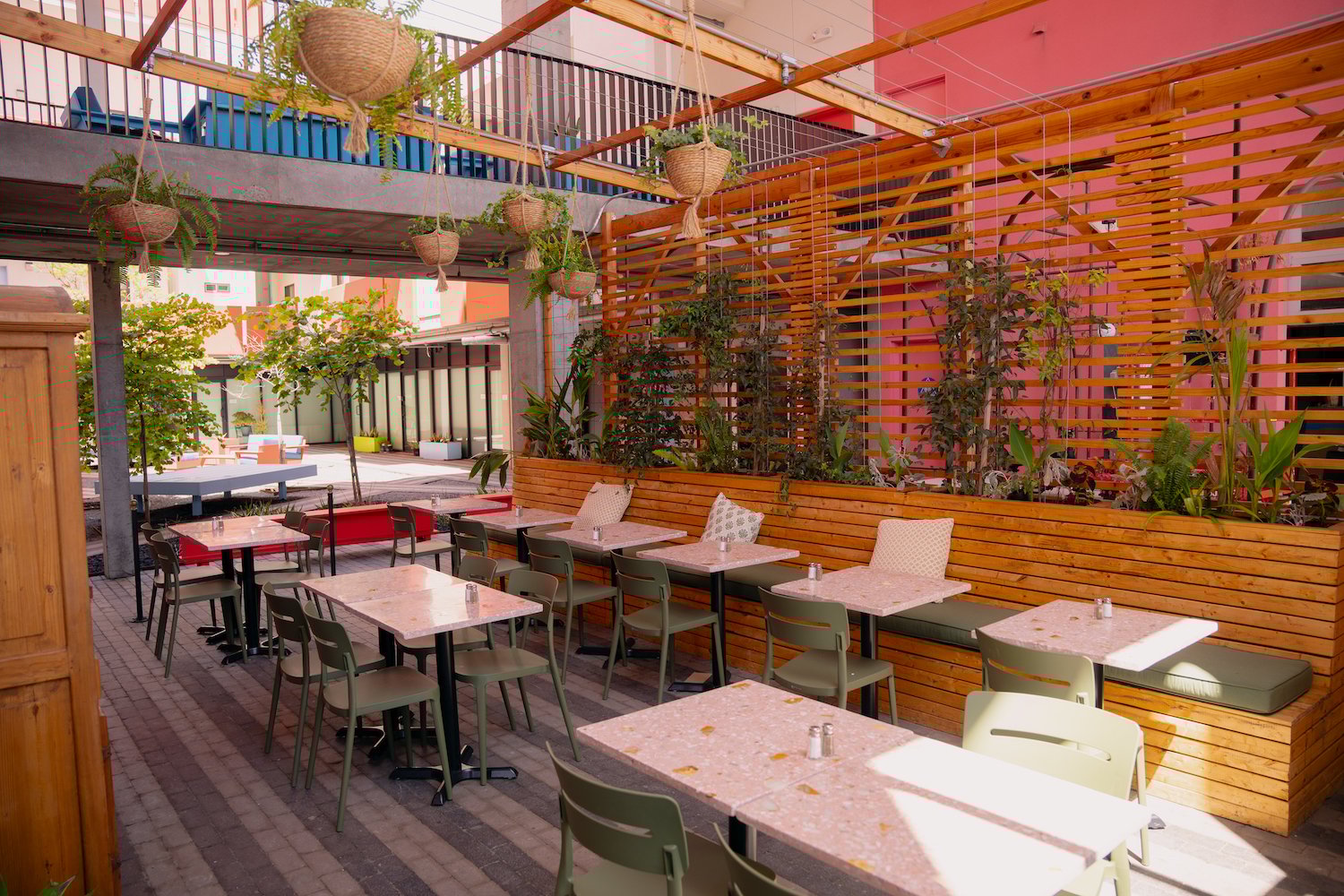 Exterior courtyard at San Diego coffee and pastry shop Madeleine in Barrio Logan opened in 2025