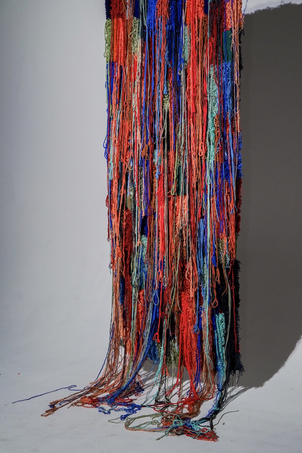 Textile rug art piece from San Diego artist Denja Harris' new art exhibit The Space Between: Texture Studies featured at Oceanside's Museum of Art