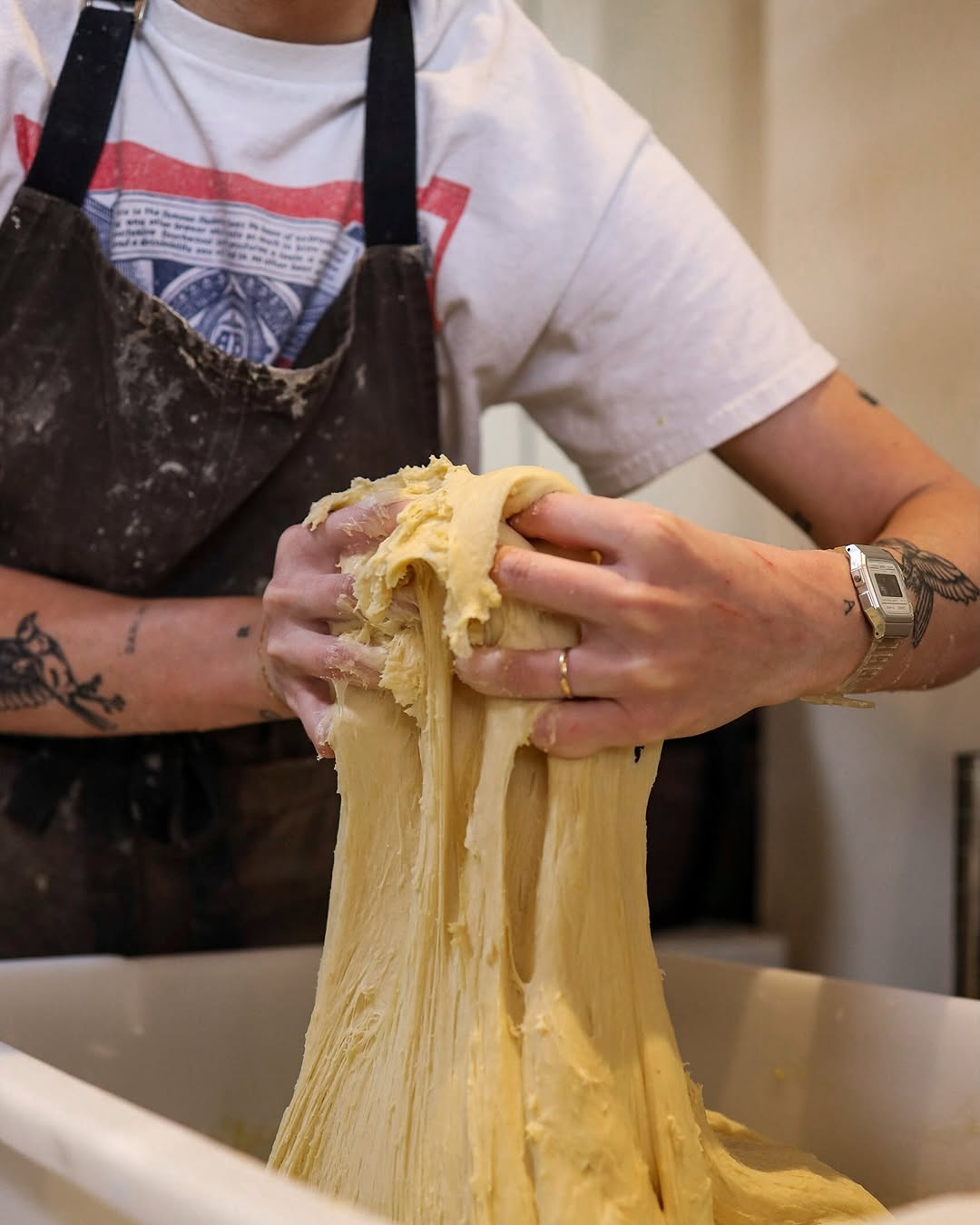 Dough being kneaded at San Diego bakery Secret Sister celebrating their 4th anniversary in 2025