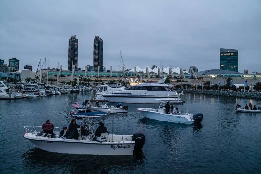 Boats docked alongside the Rady Shell at Jacobs Park watching a Ludacris concert for free