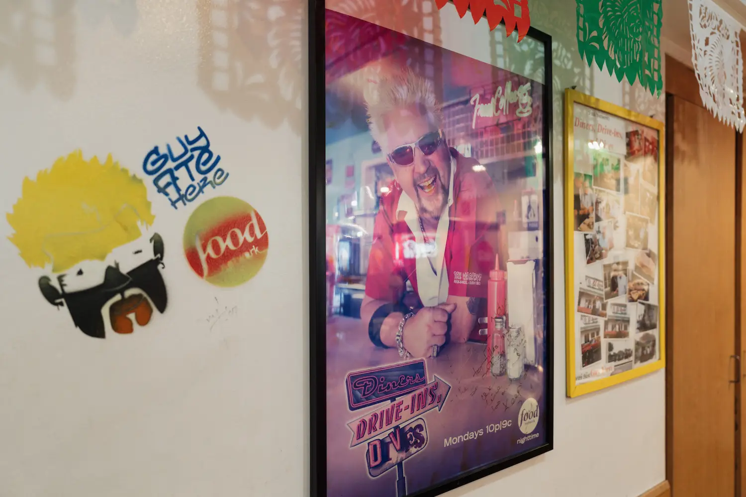 Photo of Guy Fieri in Interior of San Diego Mexican restaurant El Indio in Middletown when he visited as part of Diner's Drive-In's and Dives show