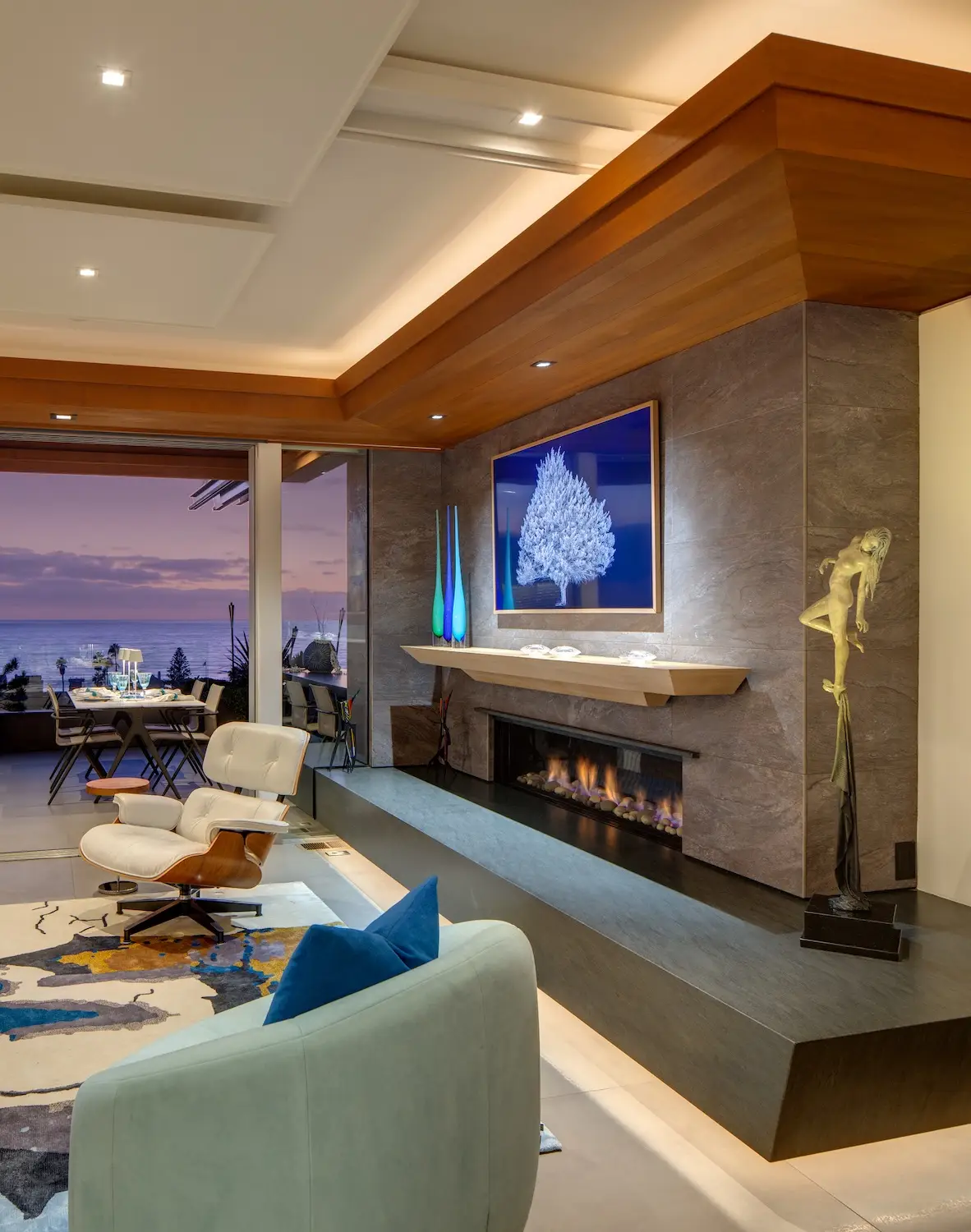 Interior of San Diego architect Dean Meredith's Del Mar home featuring a Samsung TV and fireplace