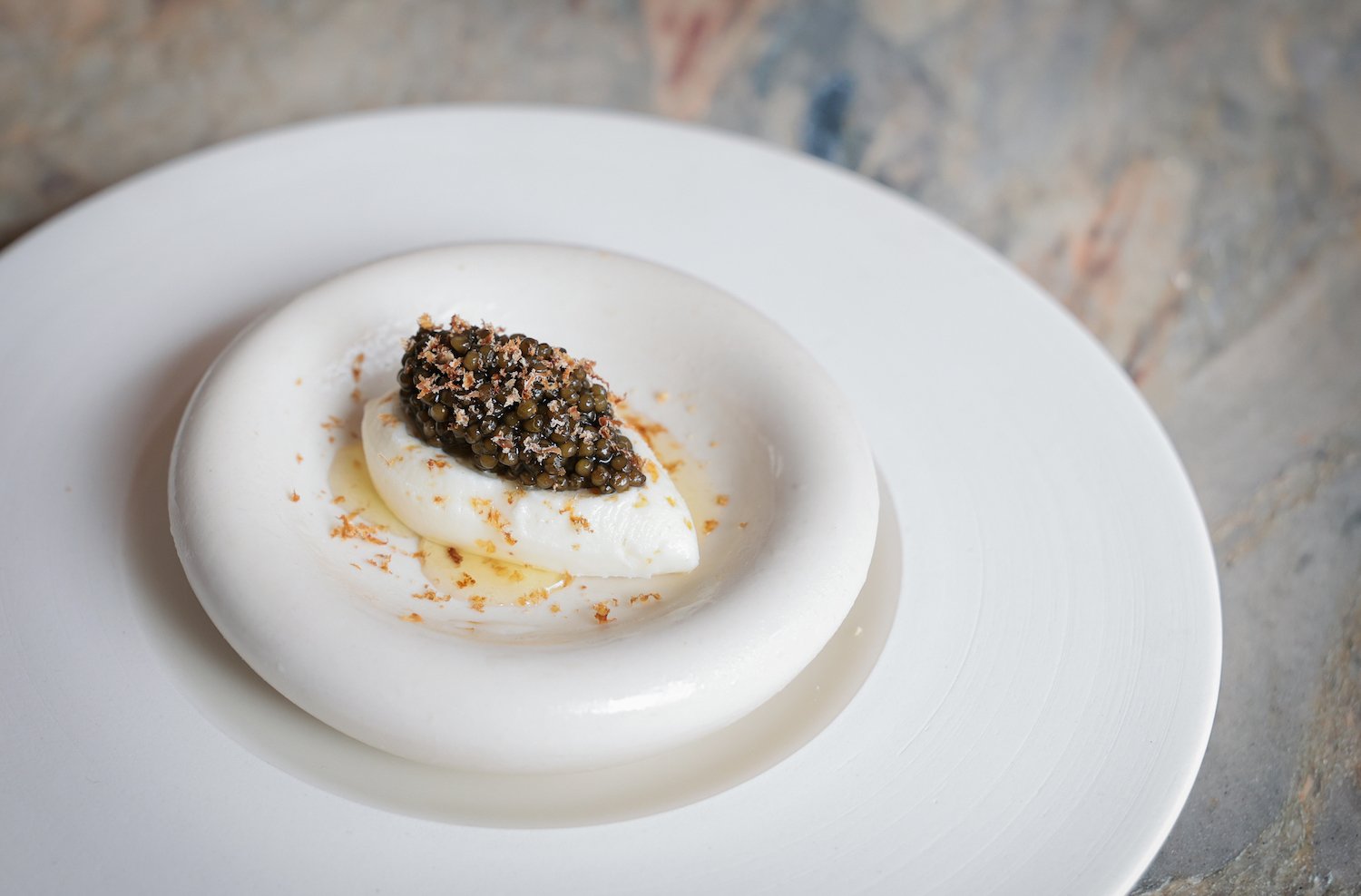 Food from new San Diego Michelin-starred restaurant Lilo in Carlsbad featuring their Ossetra Caviar