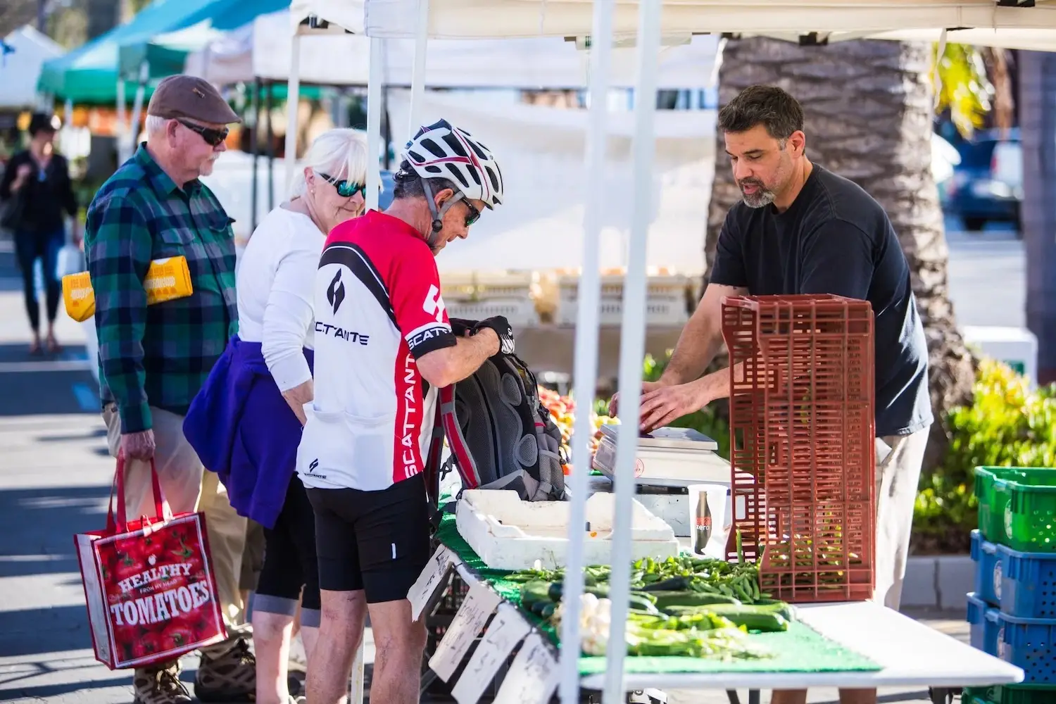 People at the Solana Beach farmers Market in San Diego