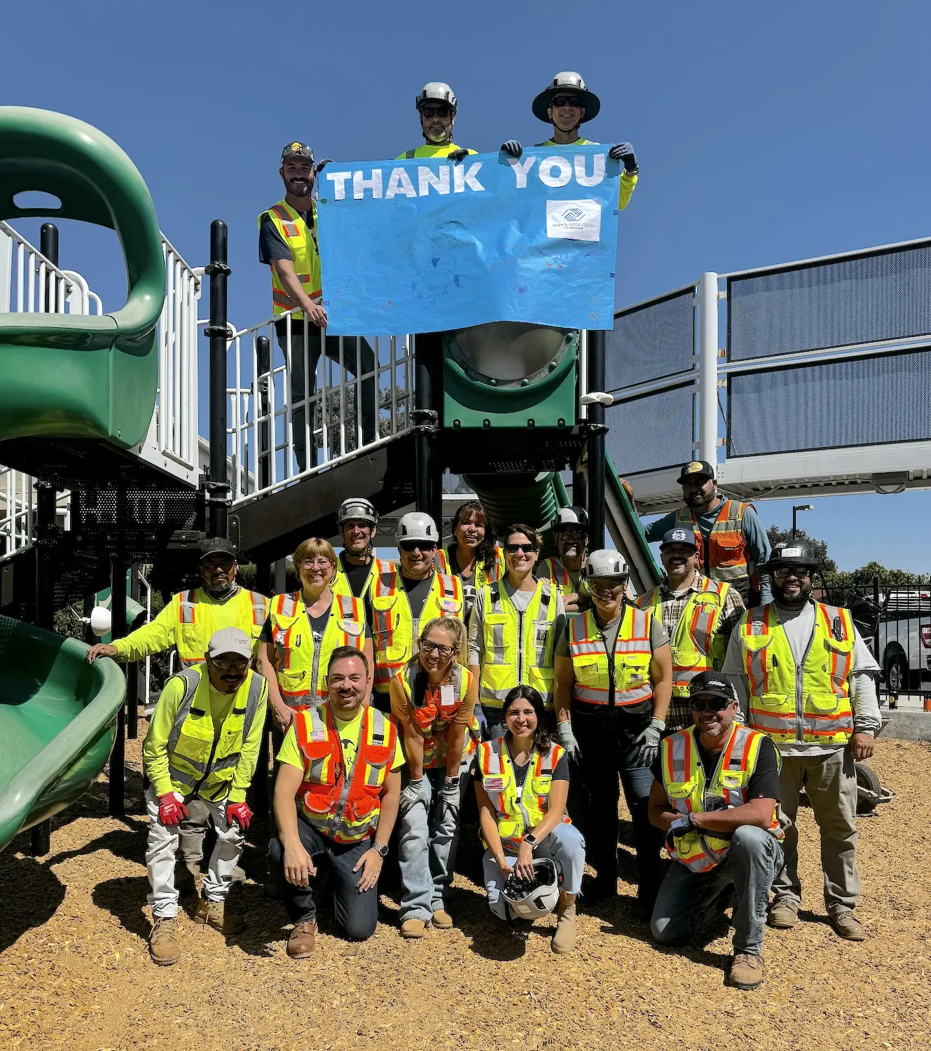 Boys & Girls Club of Greater San Diego volunteer Thomas Bancroft with team from DPR Construction that built a park for kids