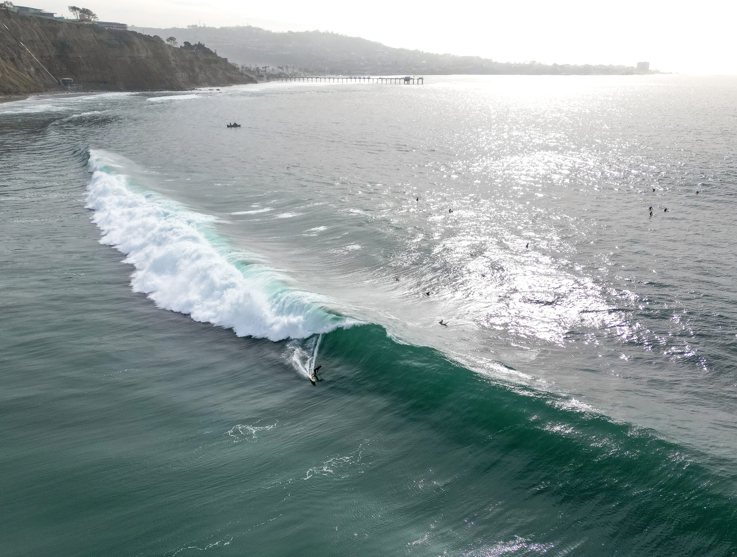 Surfer at Black's Beach San Diego surfing a big wave