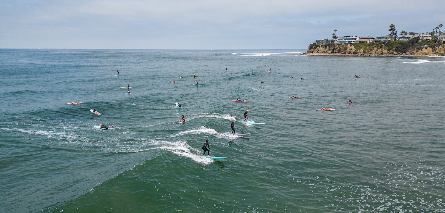 Surfers at Tourmaline surf spot in Pacific Beach, San Diego
