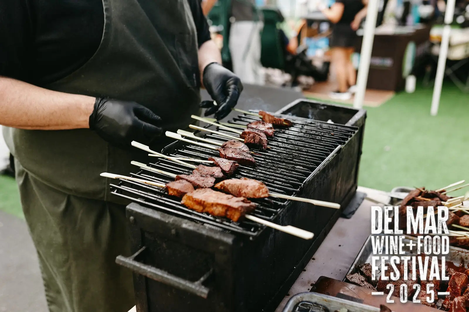 Photo gallery from the 2025 Del Mar Wine + Food festival event featuring celebrity chefs, San Diego restaurants, and California distillers