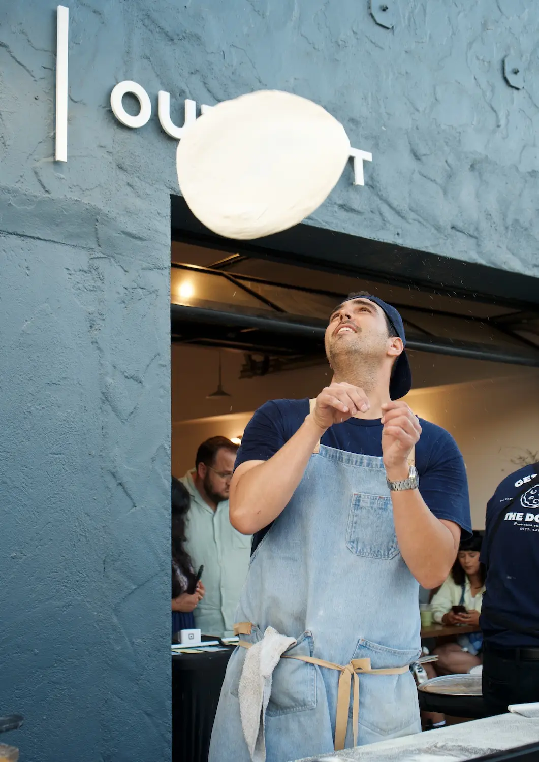 San Diego pizza pop-up restaurant Marcella featuring owner and chef Guillermo Iván tossing dough