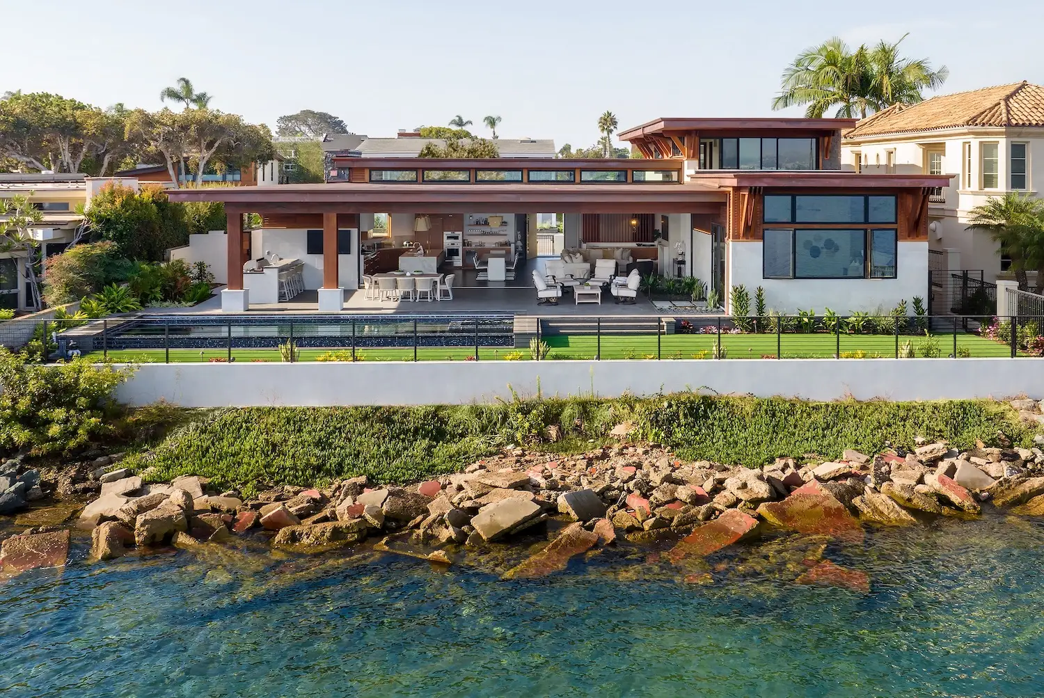 Exterior aerial view of Coronado luxury home with bayfront views renovated by Christian Rice and owned by Allan and Lyndsey Arendsee