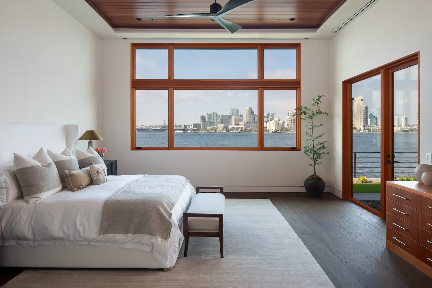 Interior of primary bedroom in a Coronado luxury home with bayfront views renovated by Christian Rice and owned by Allan and Lyndsey Arendsee