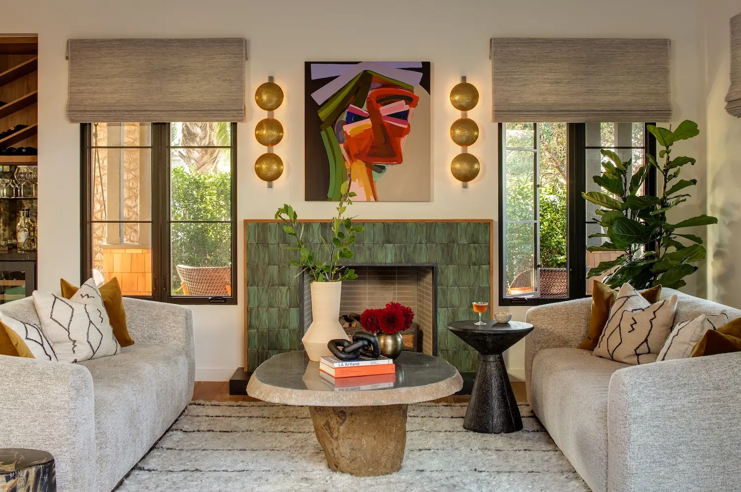 Interior of Coola Founder's Solana Beach San Diego home featuring a living room and fireplace