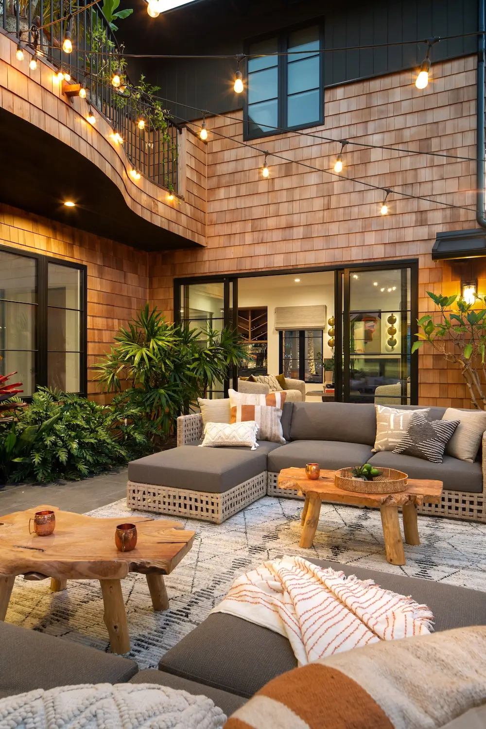 Exterior of Coola Founder's Solana Beach San Diego home featuring a courtyard with string lights