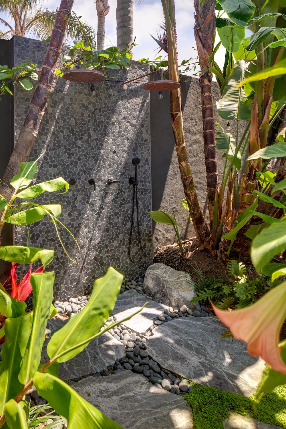 Exterior of Coola Founder's Solana Beach San Diego home featuring outdoor showers