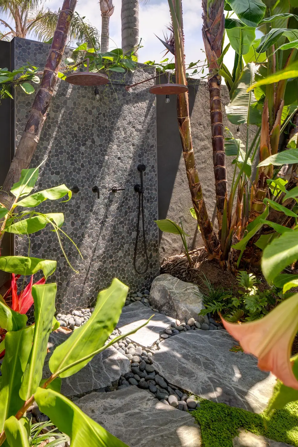 Exterior of Coola Founder's Solana Beach San Diego home featuring outdoor showers