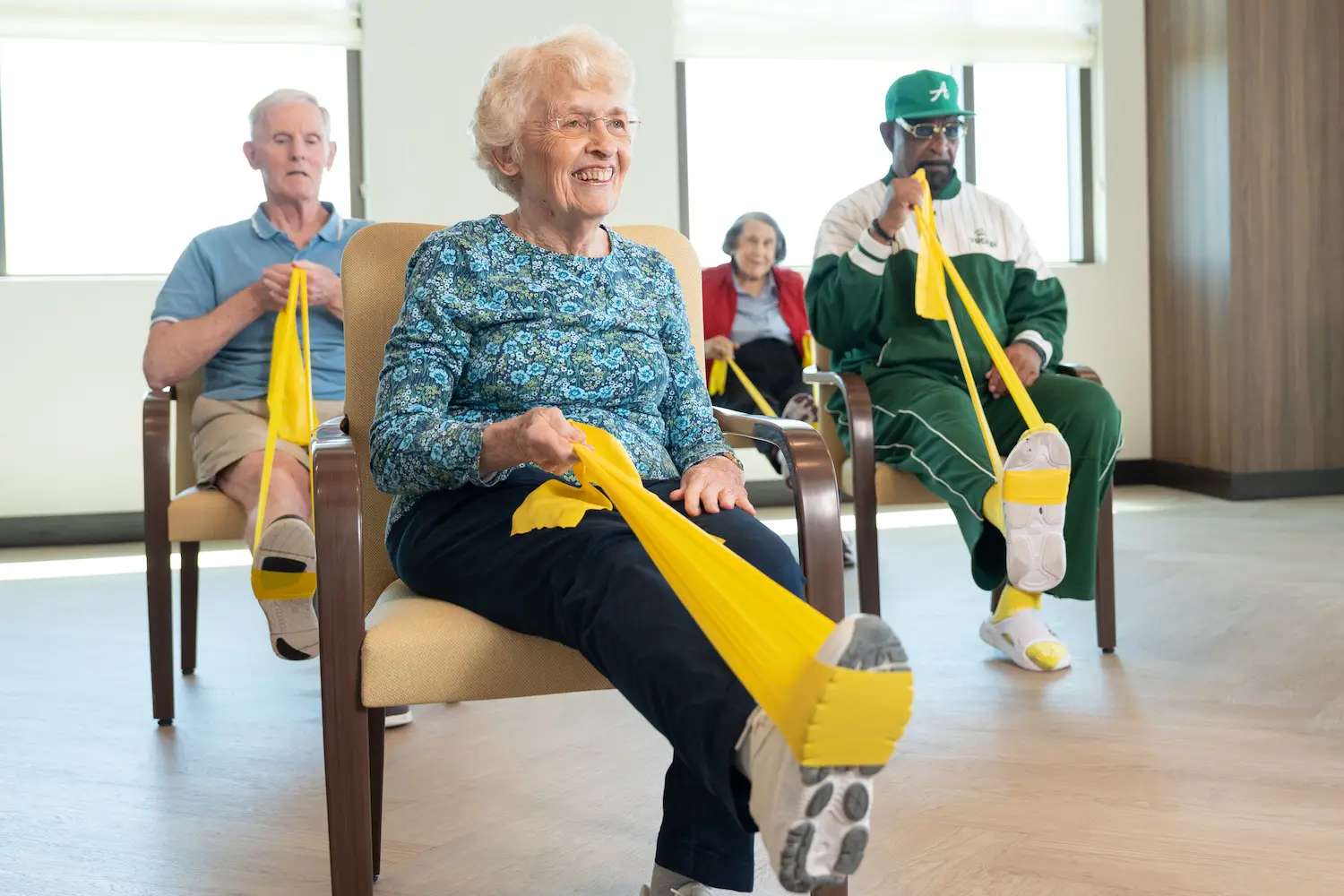 Residents at Bellmont Village La Jolla perform exercises to improve balance. These classes are part of the Living Lab project