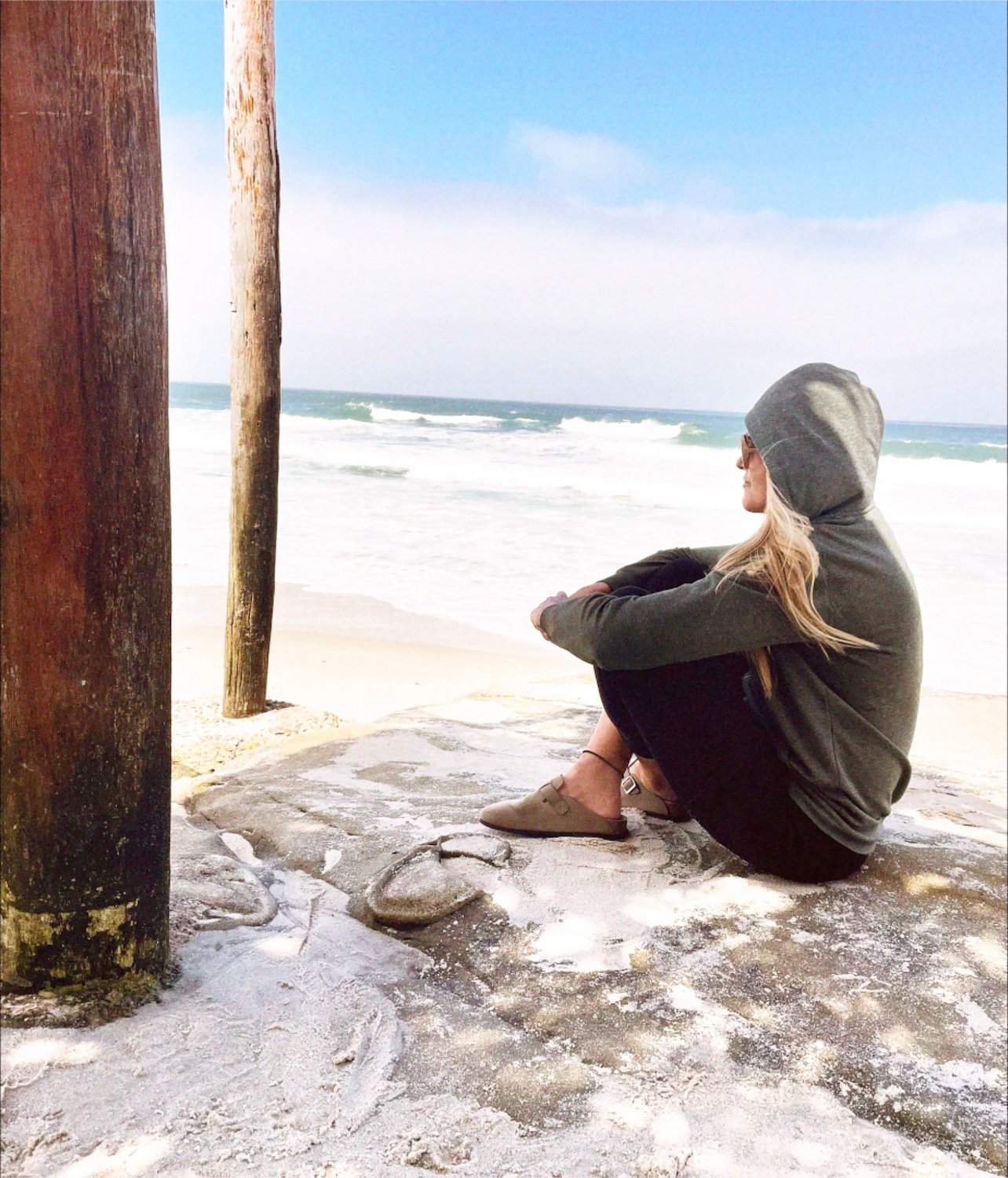 San Diego artist Erika Givens in La Jolla beachcombing for art materials