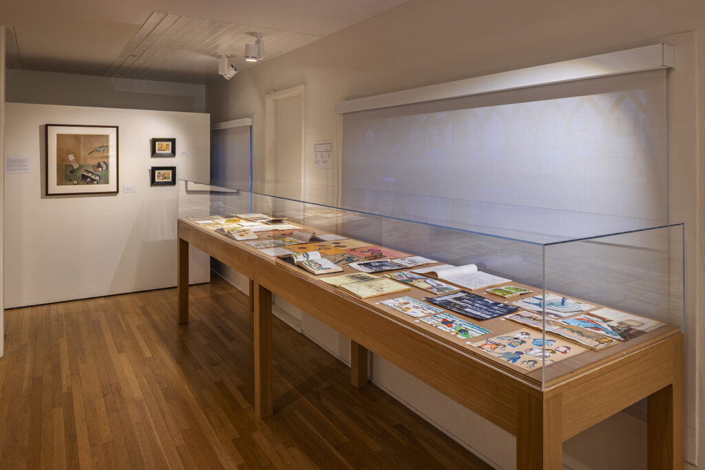 Interior of the La Jolla Historical Society hosting a new art exhibit called Double Bill: The Art of Manny Farber and Patricia Patterson